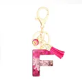 Pink glitter resin alphabet letter F keychain with gold hardware, fish scale charm and tassel. - Pink Sequin Tassel Keychain / Letter F