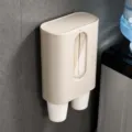 Beige wall-mounted disposable paper cup dispenser and automatic cup storage rack for home. - Double Tube Cup Dispenser / Beige