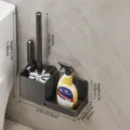 Wall-mounted black toilet brush holder set with storage box and cleaning brush for bathroom. - Elegant Black
