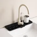 Tappetino paraspruzzi in silicone per rubinetto lavandino cucina, nero, grande. - Extra grande / Nero