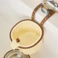 Hanging kitchen sink drain basket with filter, practical food residue strainer for easy use. - Brown