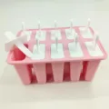 Pink silicone ice pop mold with multiple slots and white sticks, DIY home ice maker. - 10 Grids / Light Pink