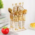 Stainless steel cutlery set with marble ceramic handle and gold storage rack detail view. - Titanium Plated Lightning Handle with Knife Holder Set