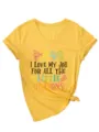 Yellow V-neck short sleeve t-shirt with funny quote print and knotted hem for women detail view - S / Tops / Yellow