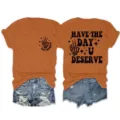 Damen Rundhals Kurzarm T-Shirt mit coolem Skelett Hand Front und Rückseite Grafikprint. - S / Oberteile / Gebranntes Orange (Schwarzer Druck)