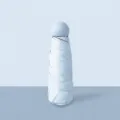 Parapluie de poche pliant mini capsule bleu ciel, compact et protection UV pour les femmes. - Bleu ciel