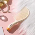 Peigne de massage compact avec bille, outil de coiffage anti-nœuds portable pour usage quotidien. - Peigne de Massage à Billes / Blanc Crème