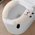 Fluffy plush toilet seat cover set in white, cute cat design with handle and hook closure. - Thick Velcro Toilet Seat Covers (1 Pair) - White Cat