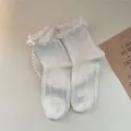 White sweet ruffle mid-tube socks with cute cable knit pattern for daily wear style. - One Size / White