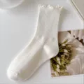 White ruffled mid tube socks for women, sweet college style ribbed knit casual cotton hosiery. - One Size / Beige