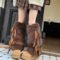 Detail shot of brown furry leg warmers and platform snow boots, perfect for winter Y2K style. - Brown