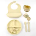 Complete silicone baby feeding set with suction bowl, divided plate, bib, cup, and spoon. - 8-Piece Set / Off White