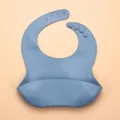 Blue silicone baby bib with crumb catcher pocket and adjustable buttons for toddlers - Grey Blue