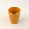 Orange silicone training cup for toddlers, drop-resistant food-grade baby drinking water cup. - Turmeric