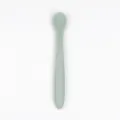 Silicone baby spoon for infant feeding training, safe food grade material in light green. - Light Green