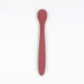 Silicone baby training spoon for infant feeding, food-grade soft spoon in red color. - Brick Red