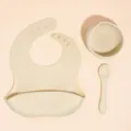Baby silicone feeding set including bib, bowl and spoon in beige color for toddlers. - Mother & Baby 3-Piece Set (Off-White)