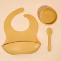 Silicone baby feeding set in yellow, including toddler bib, suction bowl and spoon for kids. - Mother & Baby 3-Piece Set (Ginger Yellow)