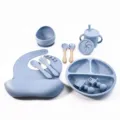 Blue silicone baby feeding set featuring a divided plate, bib, bowl, cup, and matching cutlery. - 10-Piece Set / Grey Blue