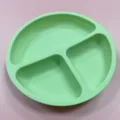 Silicone baby suction plate with divided compartments, safe green feeding dish for infants. - Round Dinner Plate / Tender Green