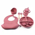 Baby silicone feeding set with divided plate, suction bowl, bib, and spoons for toddlers. - Wooden Handle 8-Piece Set / Brick Red