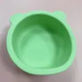 Green silicone baby bowl with cute bear ears design, soft and safe food grade material for kids. - Bear Bowl / Tender Green