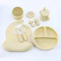 Silicone baby feeding set with suction plate, divided bowl, bib, fork, spoon, and training cup. - Silicone 8-Piece Set / Off White