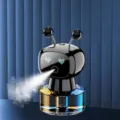 Lindo difusor humidificador de coche robot con niebla colorida y ojos LED brillantes. - [Gardenia] - Negro