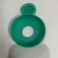 Green silicone ice cream drip guard detail view, anti-melt popsicle holder part. - Green