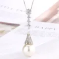 Elegant copper gold-plated pearl tassel pendant necklace, sparkling cubic zirconia details. - Pendant Only (White Pearl)