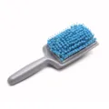 Quick dry hair brush with absorbent sponge bristles and ergonomic grey handle for easy styling. - Blue