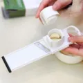 Taglia aglio e spremiaglio manuale da cucina con lama in acciaio inossidabile per uso quotidiano. - Affetta-aglio 2 in 1