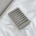 Grey silicone soap holder, compact draining soap dish for modern bathroom countertop use. - Premium Grey