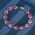 Dettaglio del bracciale tennis in argento con corindone rosa e foglie di zirconi cubici - 17cm / Corindone Rosso 3 (Rosa)