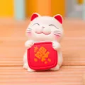 Cute cartoon lucky cat figurine with a red blessing plaque for office desk and car decor. - Blessing Arrival