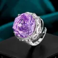Close-up detail shot of a luxury large purple gemstone cocktail ring with sparkling cubic zirconia. - Platinum Plated Silver / Violet