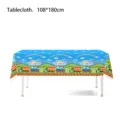 Detailed view of cartoon train birthday party tablecloth, disposable plastic table cover. - Tablecloth 1PC