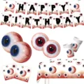 Halloween party supplies set featuring creepy eyeball paper plates, cups, and banner decor. - 6-Piece Set / Includes Plate/Cup/Napkin/Cloth/Banner