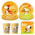 Snoopy birthday party supplies set including paper plates, cups and napkins in yellow color. - 4-Piece Set: (10 Pcs 7-Inch Plates + 10 Pcs 9-Inch Plates + 10 Pcs Cups + 20 Pcs Napkins)