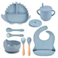 Set de vajilla de silicona para bebé con plato dinosaurio bol taza cuchara y babero azul. - Conjuntos / Gris Azulado