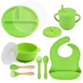 Green silicone baby tableware set with divided plate, bowl, cup, spoon, fork, and bib. - Y7 Plate + Lid + Handle Bowl + Lid + Bib + Sippy Cup + Snack Lid + Silicone Fork & Spoon + Wood Handle Fork & Spoon