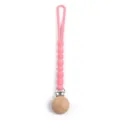 Pink silicone pacifier clip with wooden bead design for newborn baby soothing and anti-drop use. - Y14