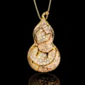 Detailed close-up of gold gourd pendant necklace paved with sparkling cubic zirconia stones. - Pendant With Box Chain