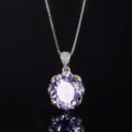Stunning luxury purple gemstone pendant necklace with delicate silver chain and crystal details. - Purple Blue Pendant With Chain
