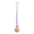 Purple silicone beaded pacifier clip with natural wooden round base and secure metal clasp. - Y2