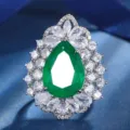 Stunning pear-cut green gemstone cocktail ring with sparkling zirconia halos for elegant women. - Ring Only (Green)