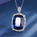 Luxury cushion cut blue gemstone pendant necklace with dazzling cubic zirconia halo setting. - Pendant Only / Sapphire Blue