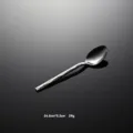 Detail shot of stainless steel diamond textured handle spoon, elegant western tableware. - Tea Spoon