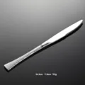 Detail view of the elegant textured handle and polished mirror stainless steel dinner knife. - Main Dinner Knife 420