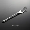 Detailed close-up view of the polished stainless steel dining fork highlighting the handle design. - Dinner Fork Only